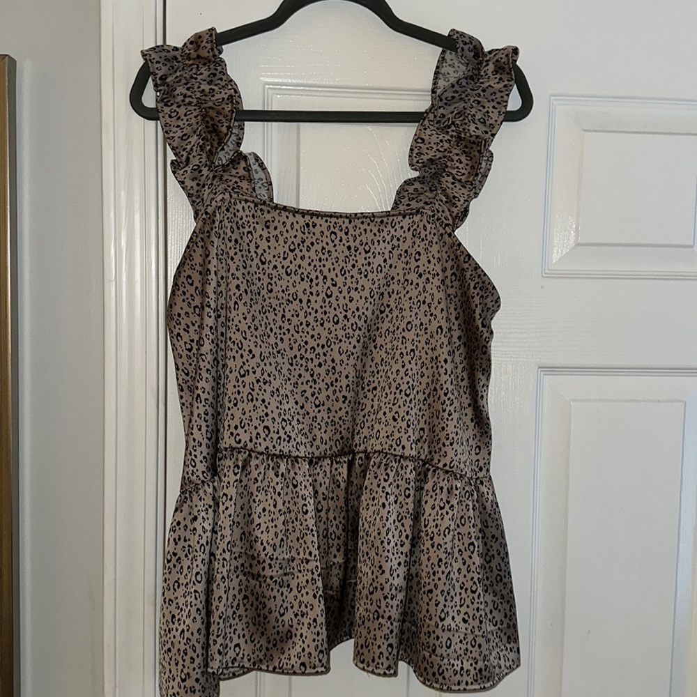 Silky material leopard top with peplum detail and ruffle straps